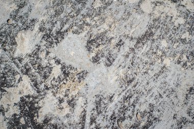 Çatlak ve eklemli eski korkunç beton bir duvarın dokusu.