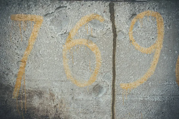 Číslice 769 Šedé Texturované Betonové Stěně Škrábanci Prasklinami — Stock fotografie