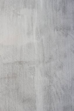 Çizgileri ve çizikleri olan bir inşaat işçisinin gri beton dokusu..