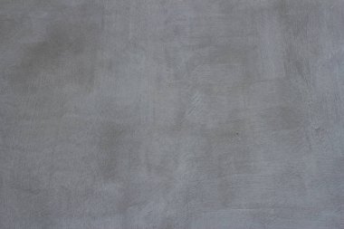 Çizgileri ve çizikleri olan bir inşaat işçisinin gri beton dokusu..