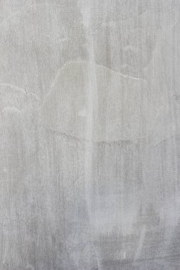 Çizgileri ve çizikleri olan bir inşaat işçisinin gri beton dokusu..