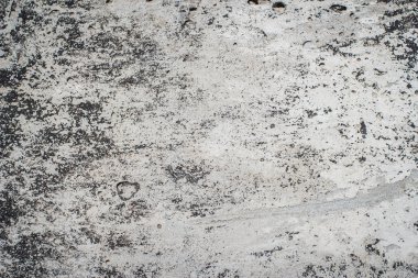 Çatlak ve eklemli eski korkunç beton bir duvarın dokusu.