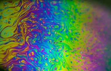 Sabun köpüğü soyutlaması hareket ve farklı renklerle çok yakın