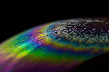 Sabun köpüğü soyutlaması hareket ve farklı renklerle çok yakın