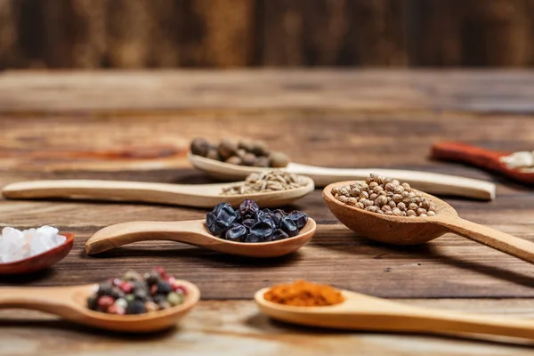 Different Spices Ingredients Wooden Spoons Wooden Table Cooking — Stock Photo, Image