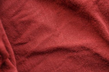 Giysiler için dokuma ve makro dekoru olan kırmızı kumaş