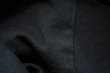 Giysiler ve dekorasyon için kalın siyah kumaş.