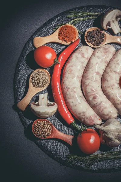 Raw Sausages Different Vegetables Spices Ingredients Black Background — Stock Photo, Image