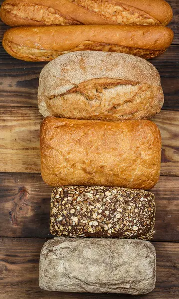 Pani Panini Diversi Con Grano Farina Tavolo Legno — Foto Stock