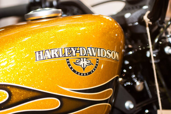 motorcycle gas tank in retro style yellow closeup