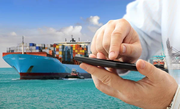 Close up of businessman using smart phone for logistic business on cargo ship background