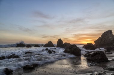 Sunset in El Matador Beach, California clipart