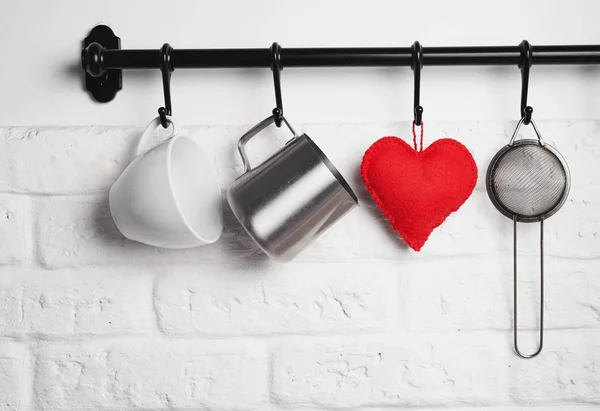 Kitchen utensils, felt heart on rank — Stock Photo, Image