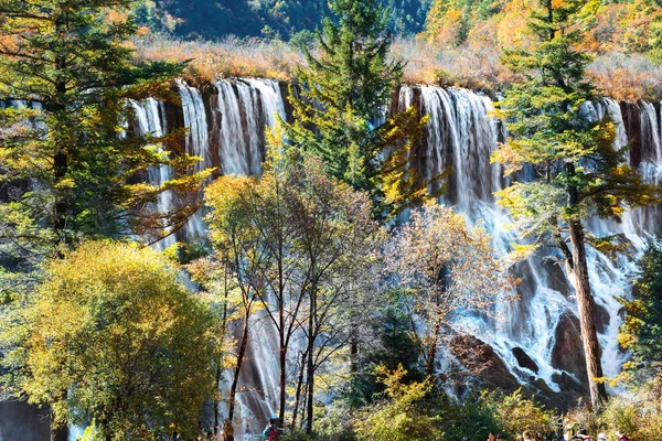 Tourist visit the Nuorilang Waterfall in Jiuzhaigou National Par — Stock Photo, Image