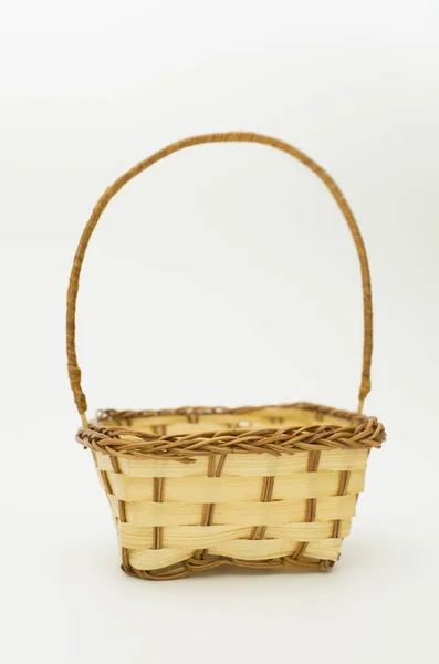 Wicker basket on a white background — Stock Photo, Image