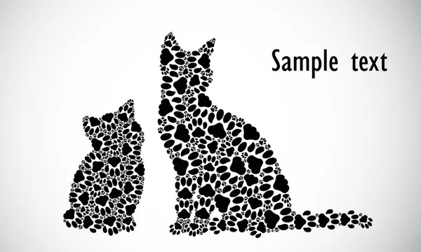 Silhouettes of cat and kitten — Stock Vector