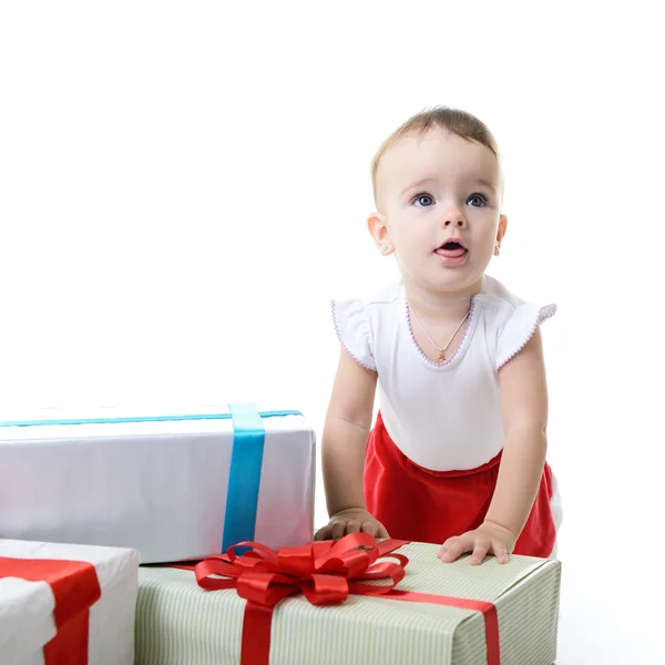 Cheerful girl with christmas presents — Stock Photo, Image