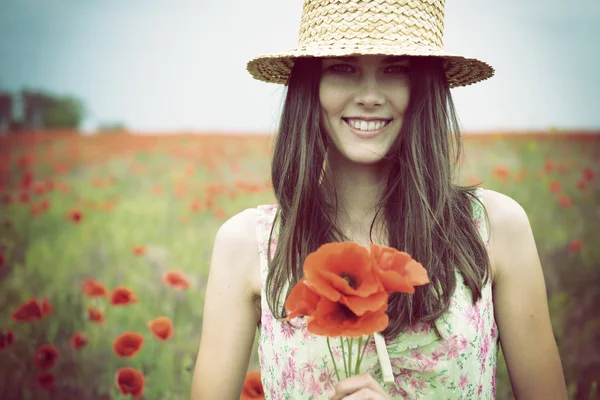 Woman in straw hat — Stock Photo, Image