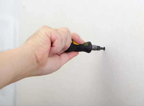 Repairman works with dry-stone wall — Stock Photo, Image