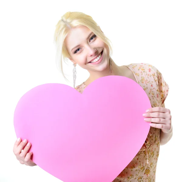 Woman holding pink heart — Stock Photo, Image
