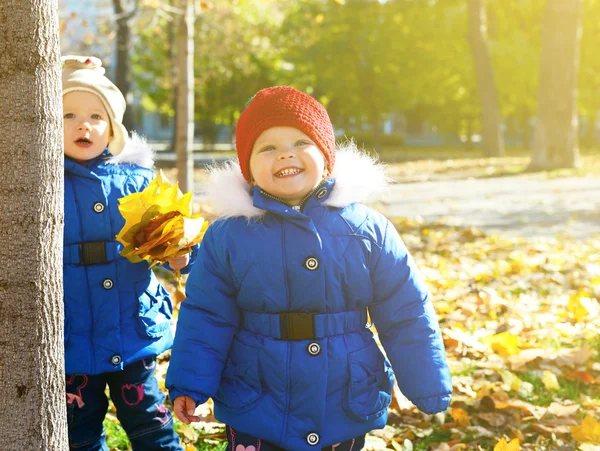 Cute girls playing in park — Stock Photo, Image