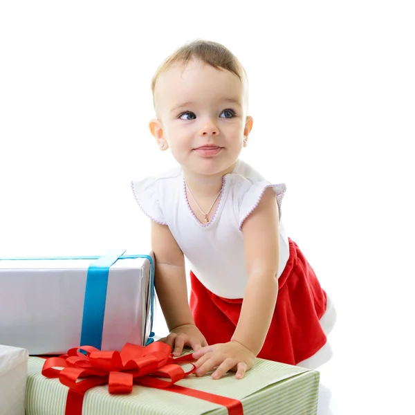 Adorable girl with christmas presents Stock Image