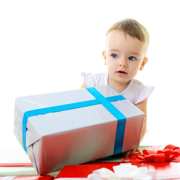 Baby girl with presents — Stock Photo, Image