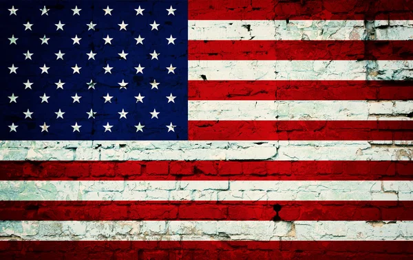 Flag on wall of bricks — Stock Photo, Image