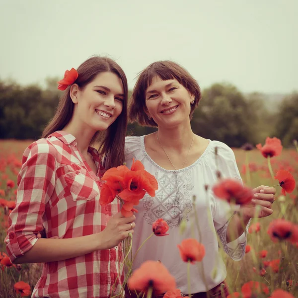 Attractive lady with daughter — Stockfoto