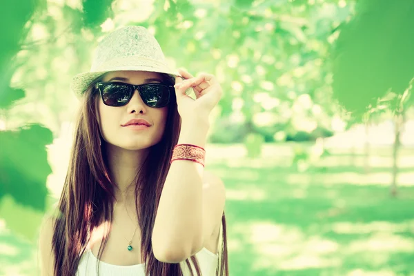 young woman walking in park