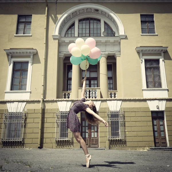 Girl with balloons outdoor — Stock Photo, Image