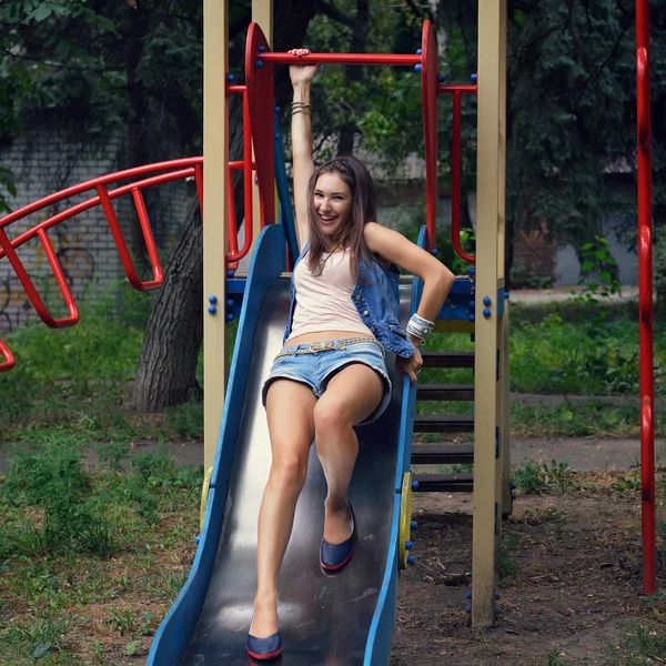 Beautiful girl on playground — Stock Photo, Image