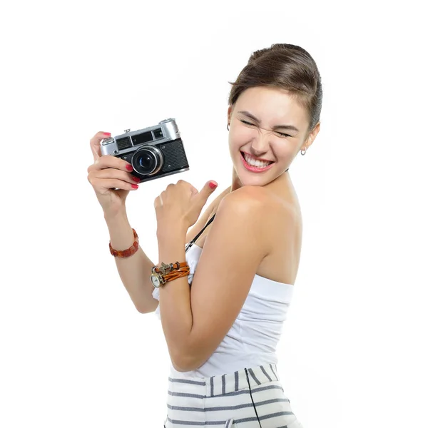 Mujer sosteniendo cámara retro —  Fotos de Stock