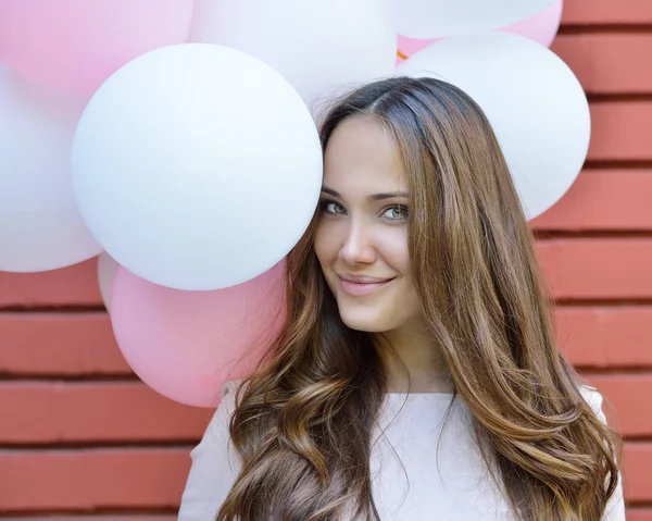 Mujer joven con globos —  Fotos de Stock