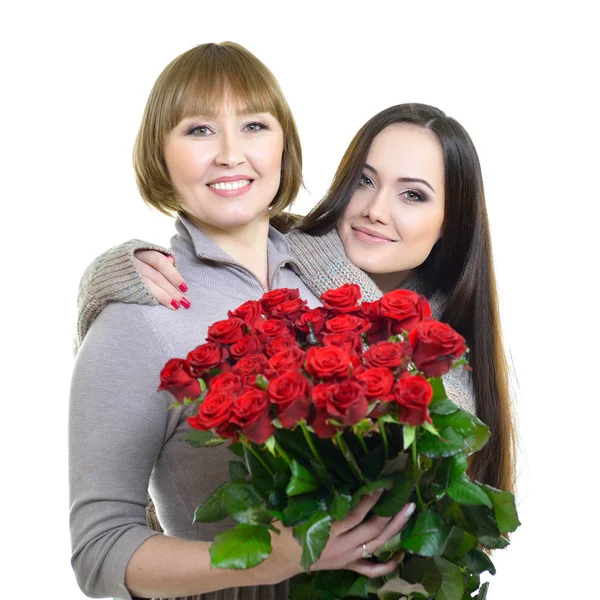 Moeder en dochter met bloemen — Stockfoto