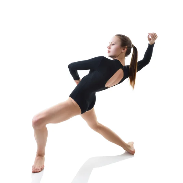 Beautiful girl dancing in studio — Stock Photo, Image