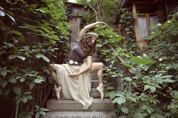 Girl posing on stairs — Stock Photo, Image