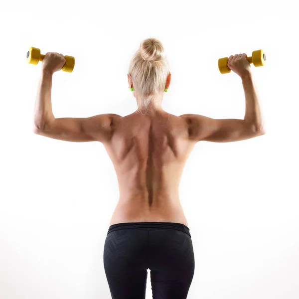 Athletische Frau in schwarzer Sportbekleidung — Stockfoto