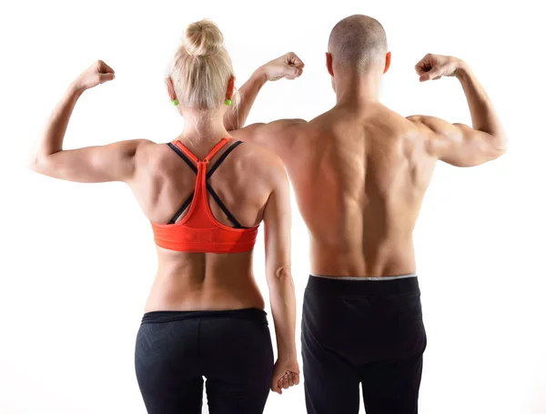 Muscular man and woman — Stock Photo, Image