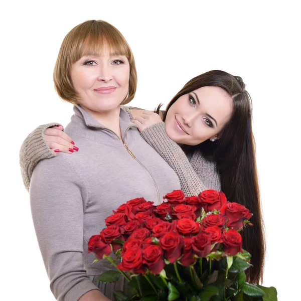 Moeder en dochter met bloemen — Stockfoto