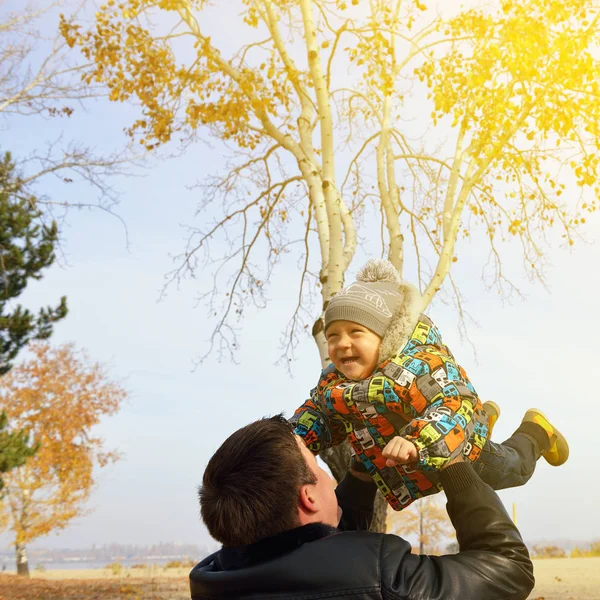 Little son in autumn park — Stock Photo, Image