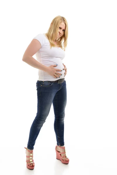 Übergewichtige Junge Frau Berührt Ihren Bauch Vor Weißem Hintergrund — Stockfoto