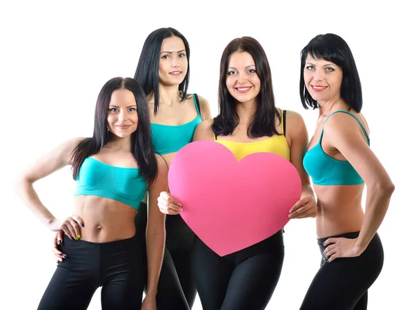 Donne fitness con cuore rosa — Foto Stock