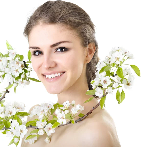 Mujer con ramas florecientes —  Fotos de Stock