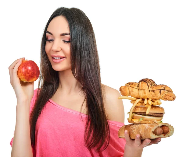 Mujer joven con comida rápida — Foto de Stock