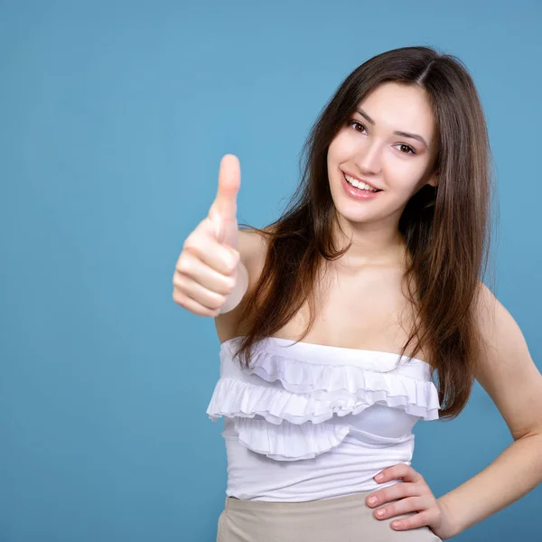 Woman with thumbs up gesture — Stock Photo, Image