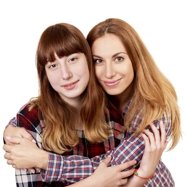Mutter und Tochter. Familienatelier Porträt über weißem Hintergrund — Stockfoto