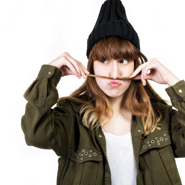 Funny teen girl makes  mustache of her red hair isolated on whit — Stock Photo, Image