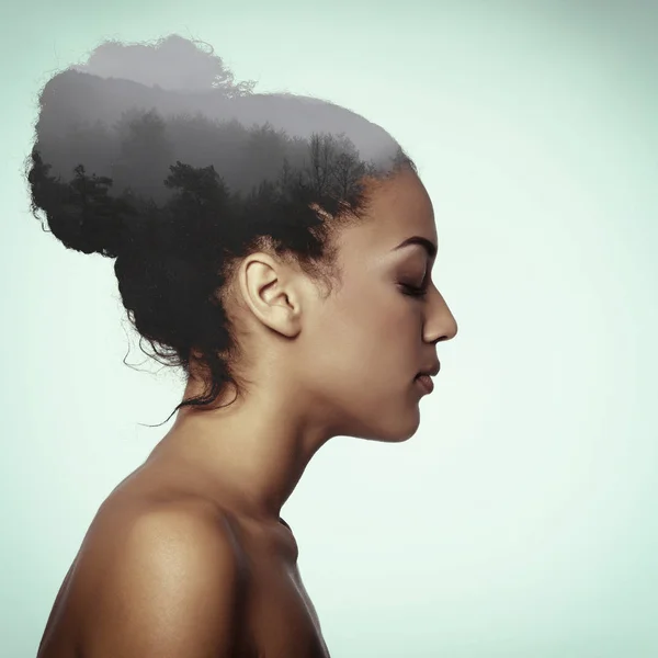 Double exposure beauty portrait of young mulatto woman in profil — Stock Photo, Image