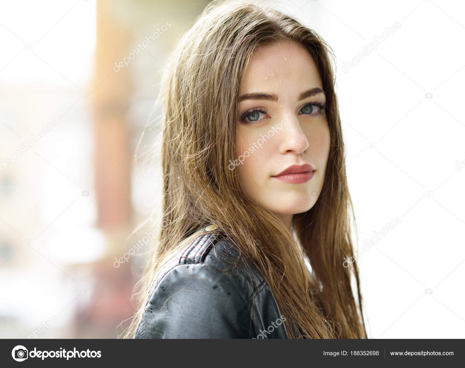 Young attractive woman standing in the rain directing her face t Stock ...